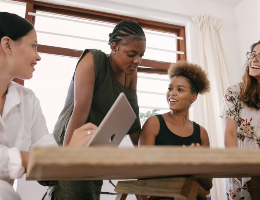 4 Smiling Business Women